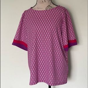 Short sleeve Chico’s top. Never been worn.